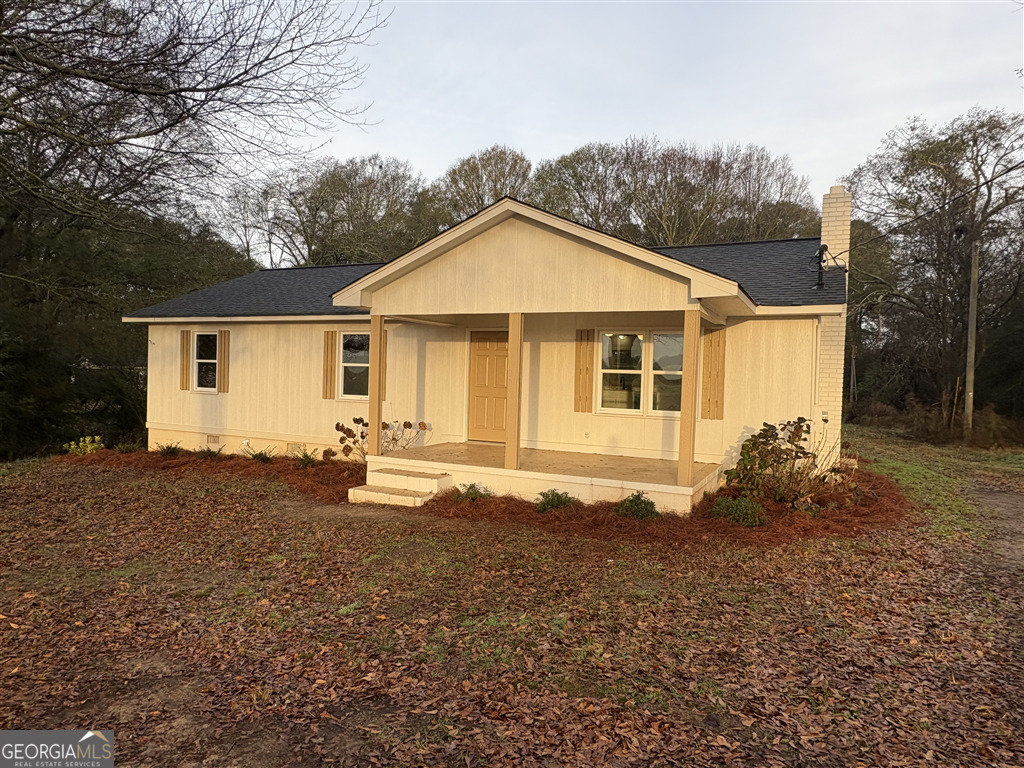 358 Misty Mills Road Lavonia, GA 30553 - Photo 7 of 7 a front view of a house with yard