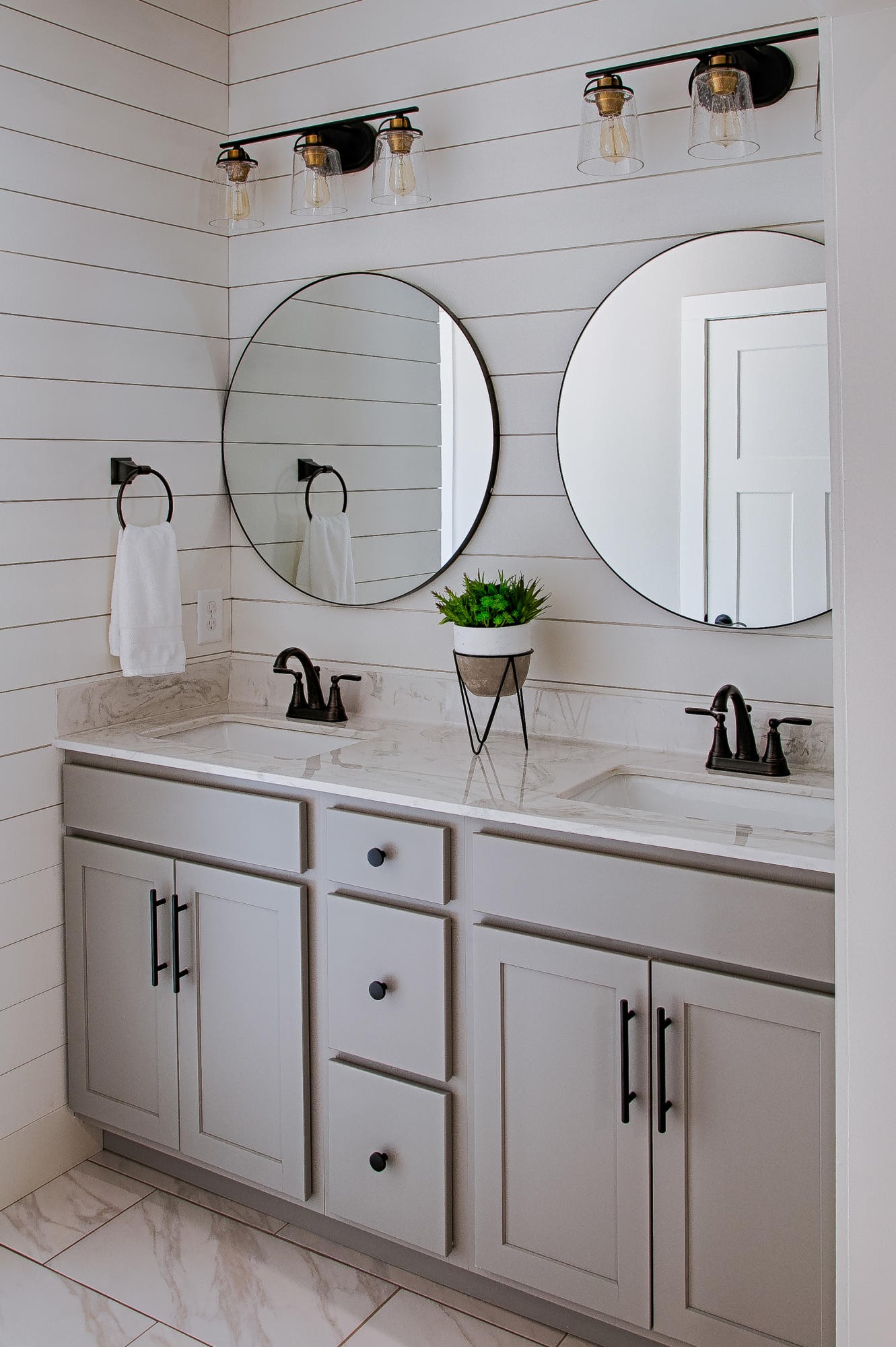 3423 West Wolf Valley Road Clinton, TN 37716 - Photo 18 of 34 a bathroom with a sink and a mirror