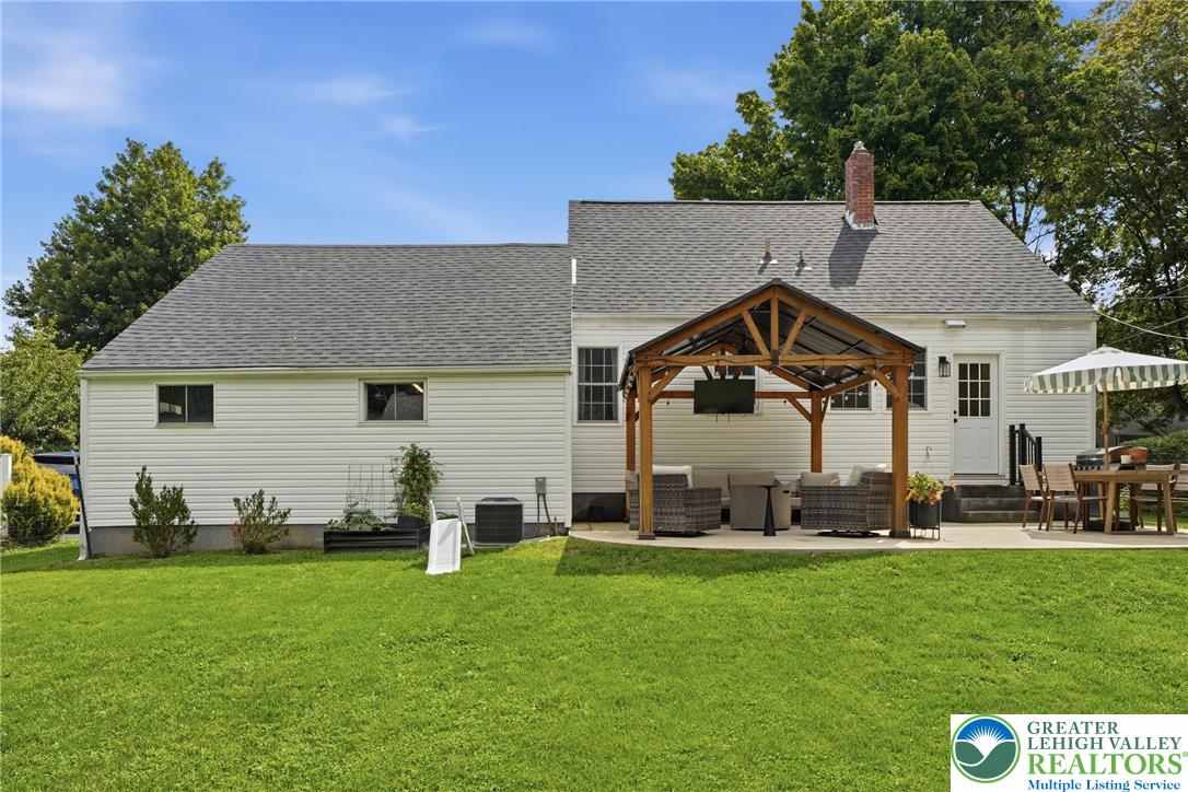 408 Maple Road Hellertown, PA 18055 - Photo 54 of 66 A spacious green lawn sits behind this classic home complete with a timber gazebo.