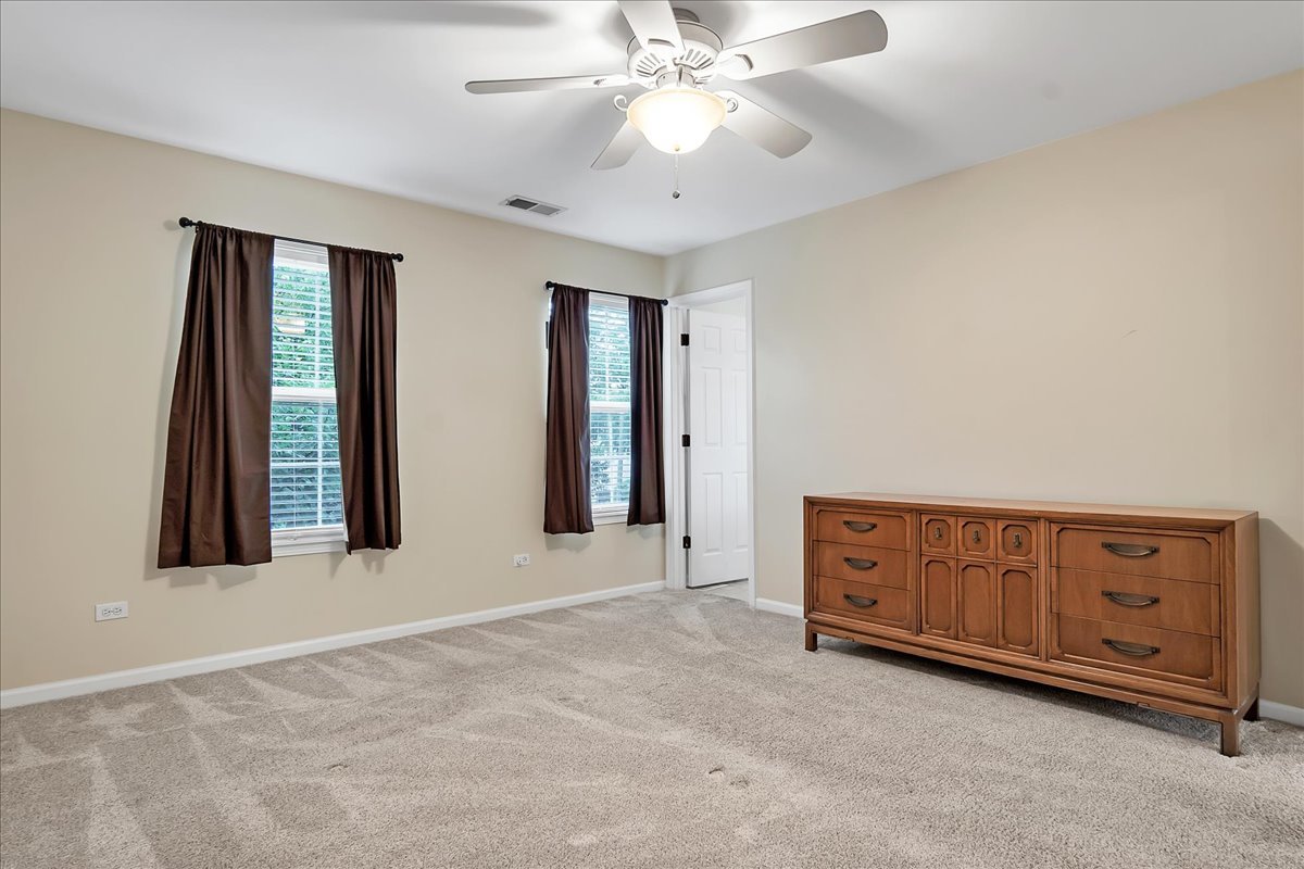 2591 Smithfield Lane Aurora, IL 60503 - Photo 15 of 31 a view of an empty room with window and cabinet