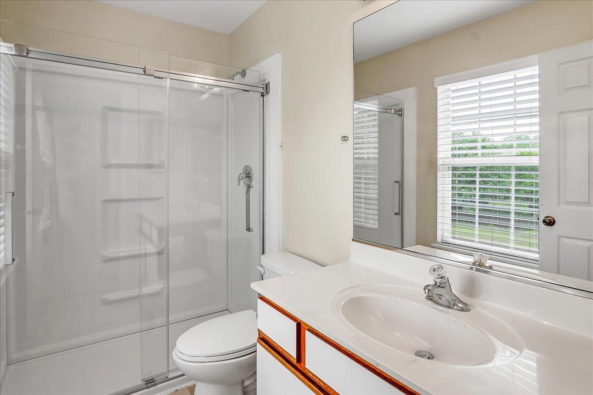 2591 Smithfield Lane Aurora, IL 60503 - Photo 17 of 31 a bathroom with a sink toilet and shower
