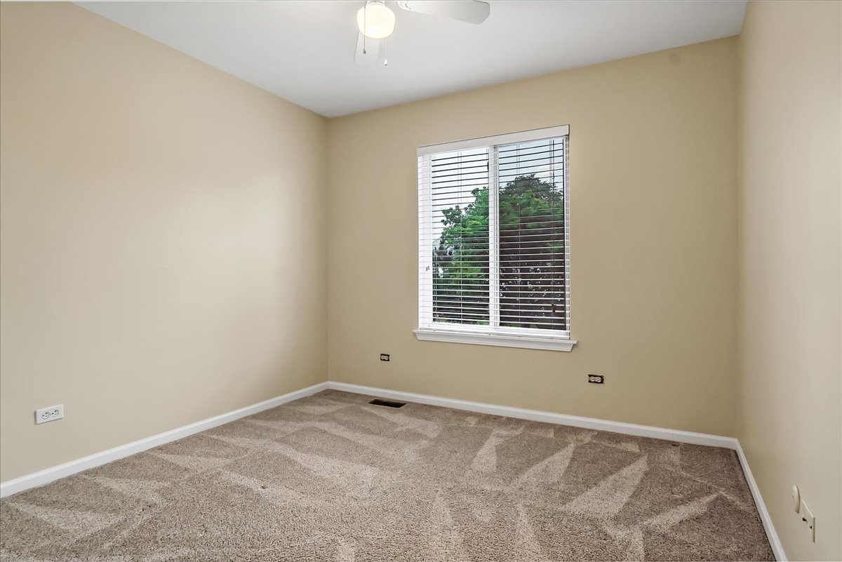 2591 Smithfield Lane Aurora, IL 60503 - Photo 19 of 31 an empty room with a window