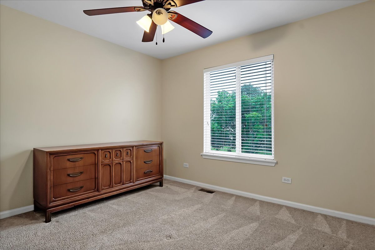 2591 Smithfield Lane Aurora, IL 60503 - Photo 21 of 31 a view of an empty room with a window