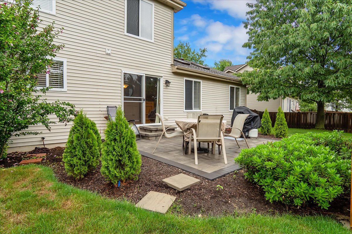 2591 Smithfield Lane Aurora, IL 60503 - Photo 26 of 31 a view of a house with backyard and sitting area