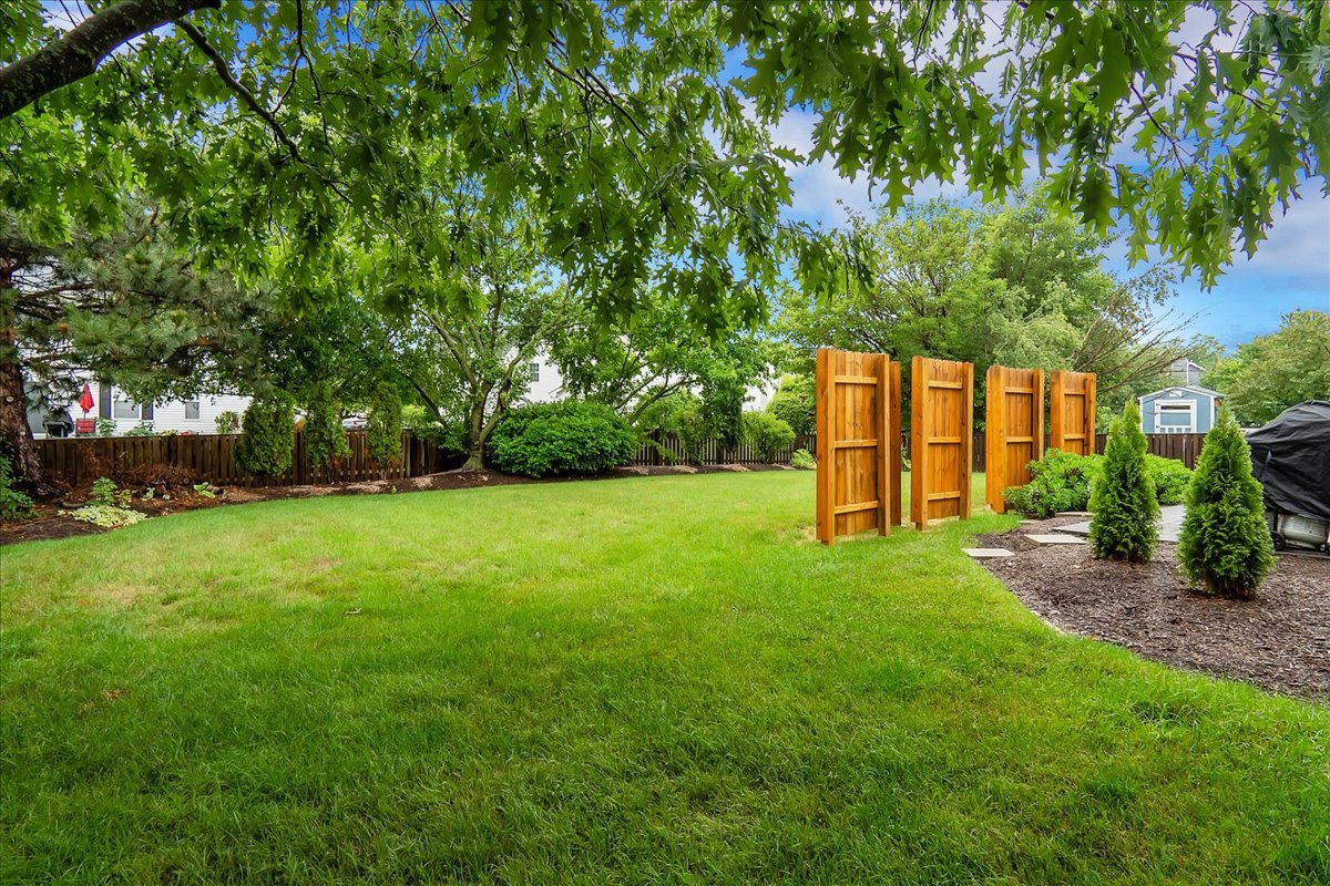 2591 Smithfield Lane Aurora, IL 60503 - Photo 30 of 31 a backyard of a house with lots of green space
