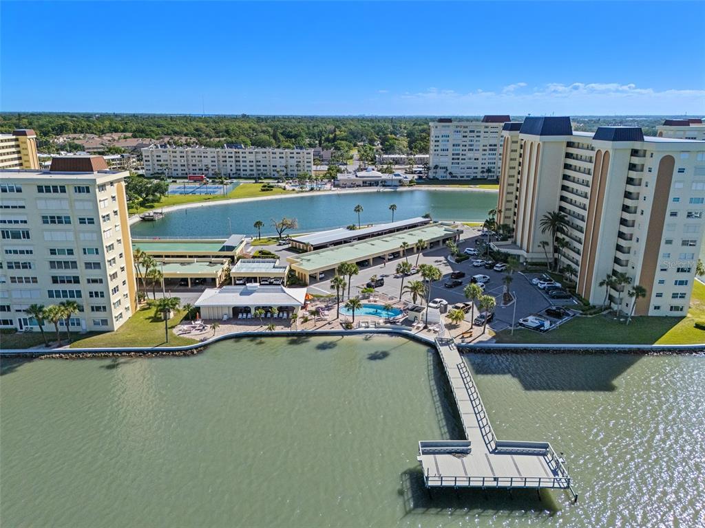 4775 Cove Circle, Unit 103 St. Petersburg, FL 33708 - Photo 35 of 61 a view of a city with tall buildings