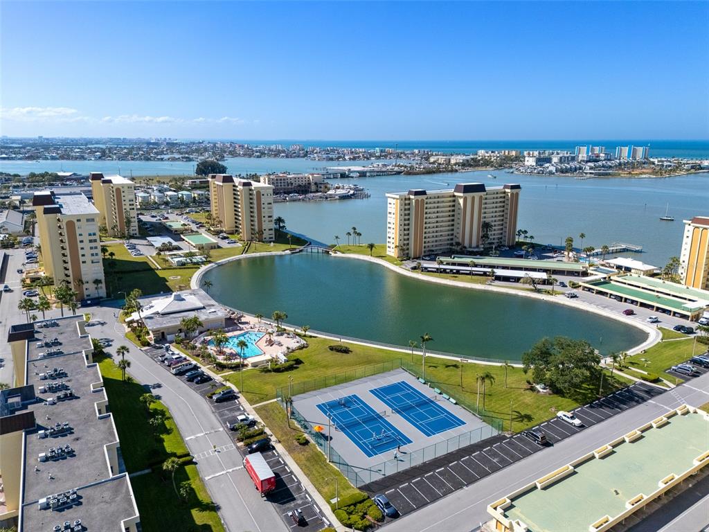 4775 Cove Circle, Unit 103 St. Petersburg, FL 33708 - Photo 51 of 61 a view of a city and an ocean view