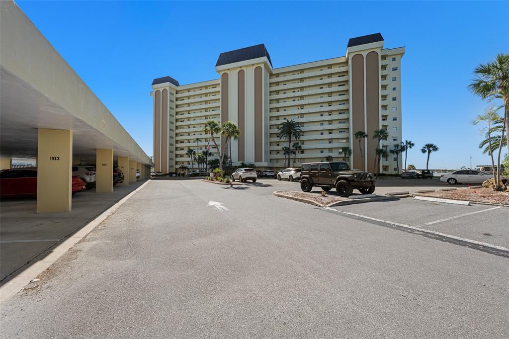 4775 Cove Circle, Unit 103 St. Petersburg, FL 33708 - Photo 58 of 61 a view of balcony with tall buildings