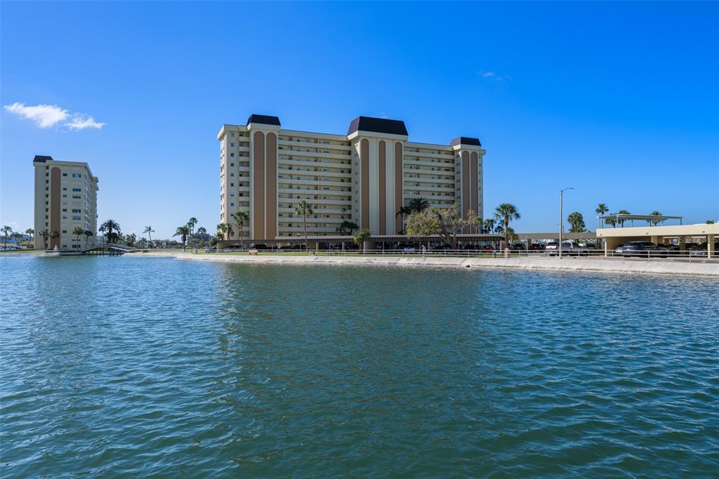 4775 Cove Circle, Unit 103 St. Petersburg, FL 33708 - Photo 59 of 61 a view of ocean and building