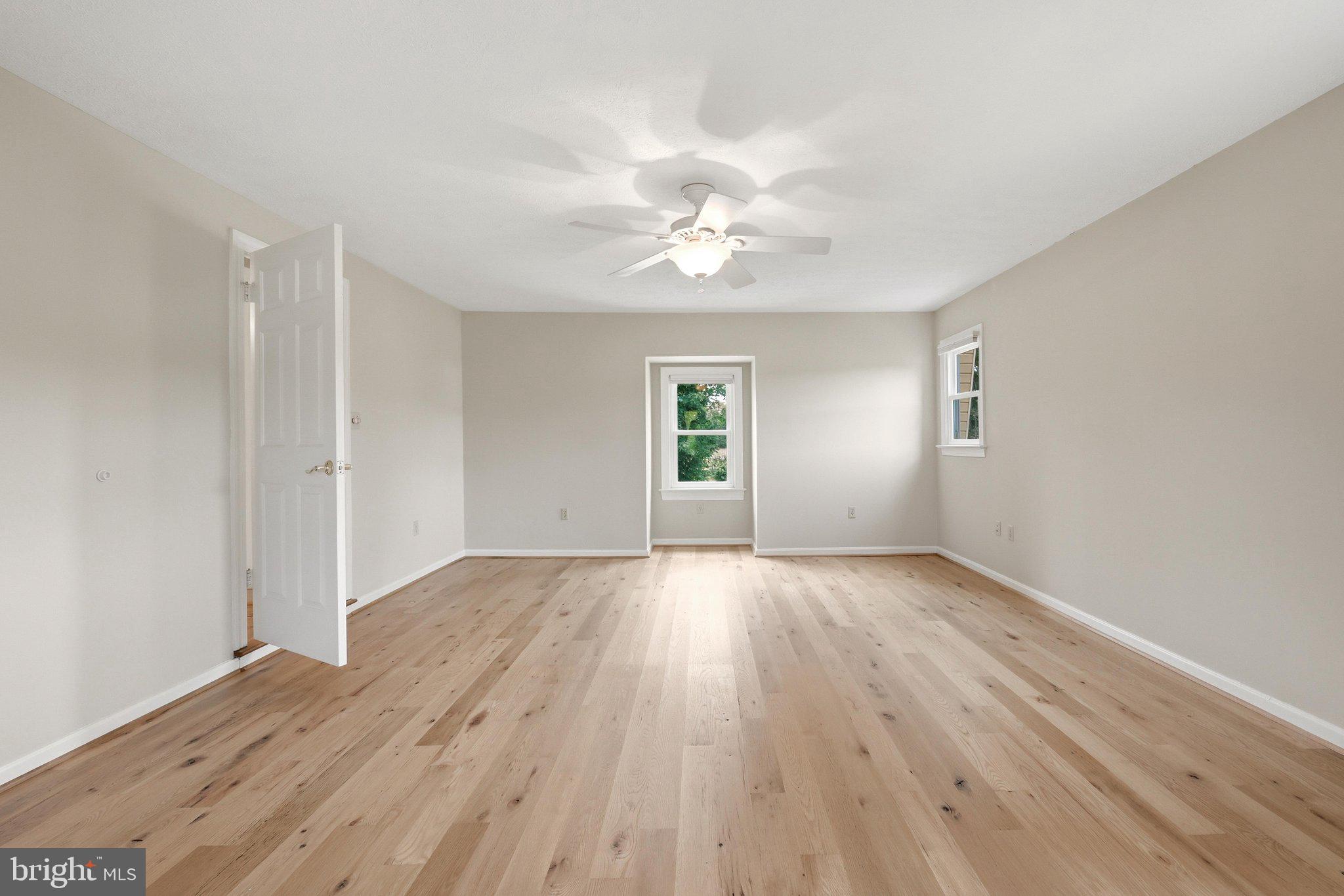 936 Gun Barrel Road White Post, VA 22663 - Photo 42 of 106 Large Primary Bedroom w Floors Milled From a Barn
