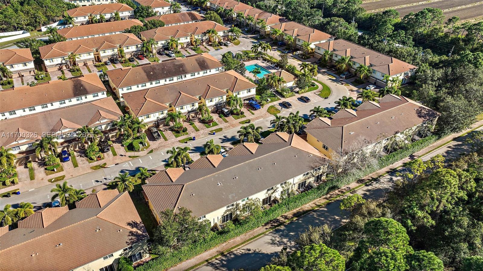 9491 Southwest Merlin Court Stuart, FL 34997 - Photo 39 of 45 an aerial view of a house