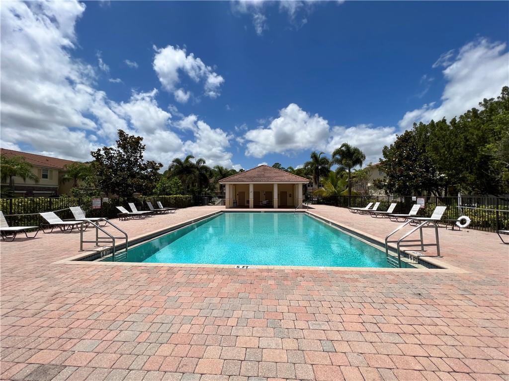 9491 Southwest Merlin Court Stuart, FL 34997 - Photo 41 of 45 a view of a swimming pool with a patio