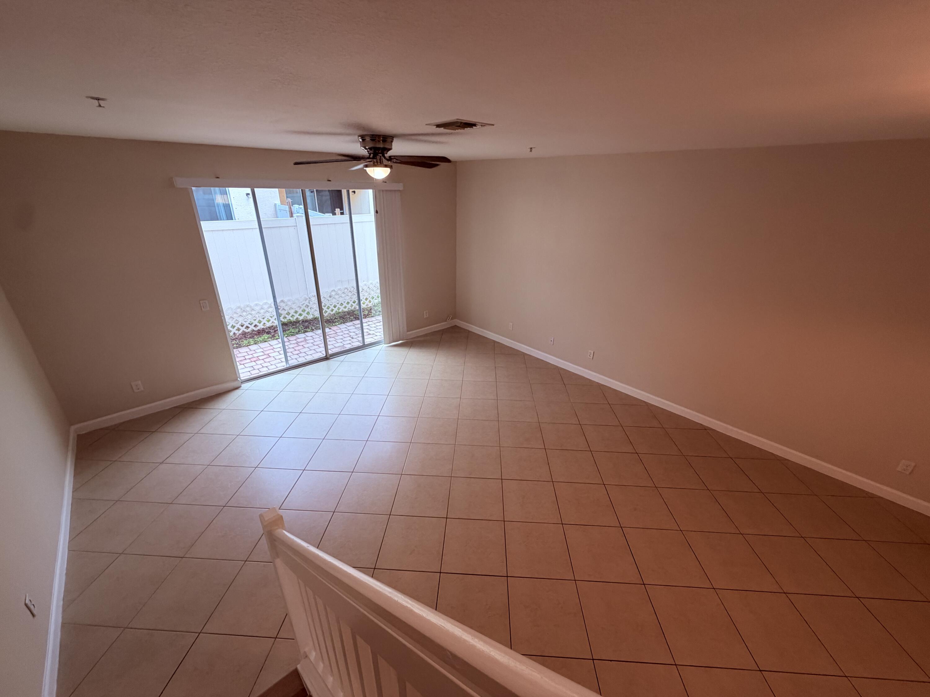 9491 Southwest Merlin Court Stuart, FL 34997 - Photo 5 of 45 IMG_4145