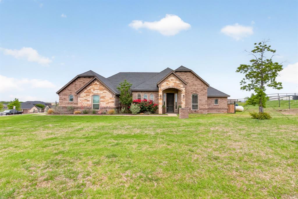 7320 Spring Ranch Court Godley, TX 76044 - Photo 8 of 38 a view of a house with garden and yard