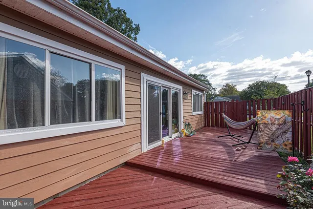 a view of a deck with furniture
