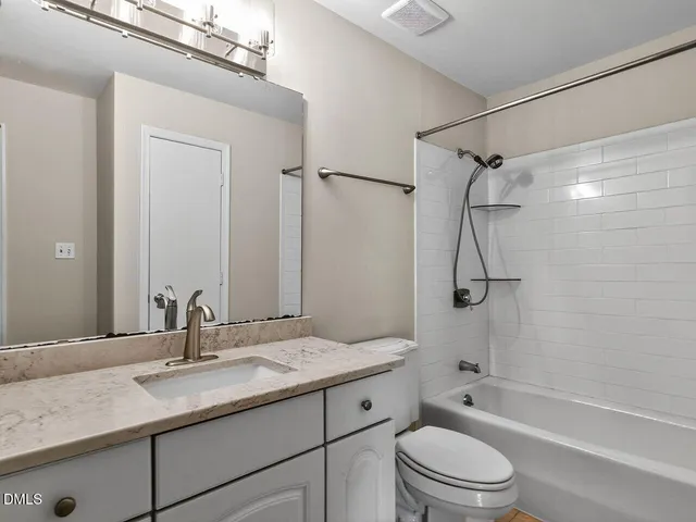 a view of balcony with wooden floor