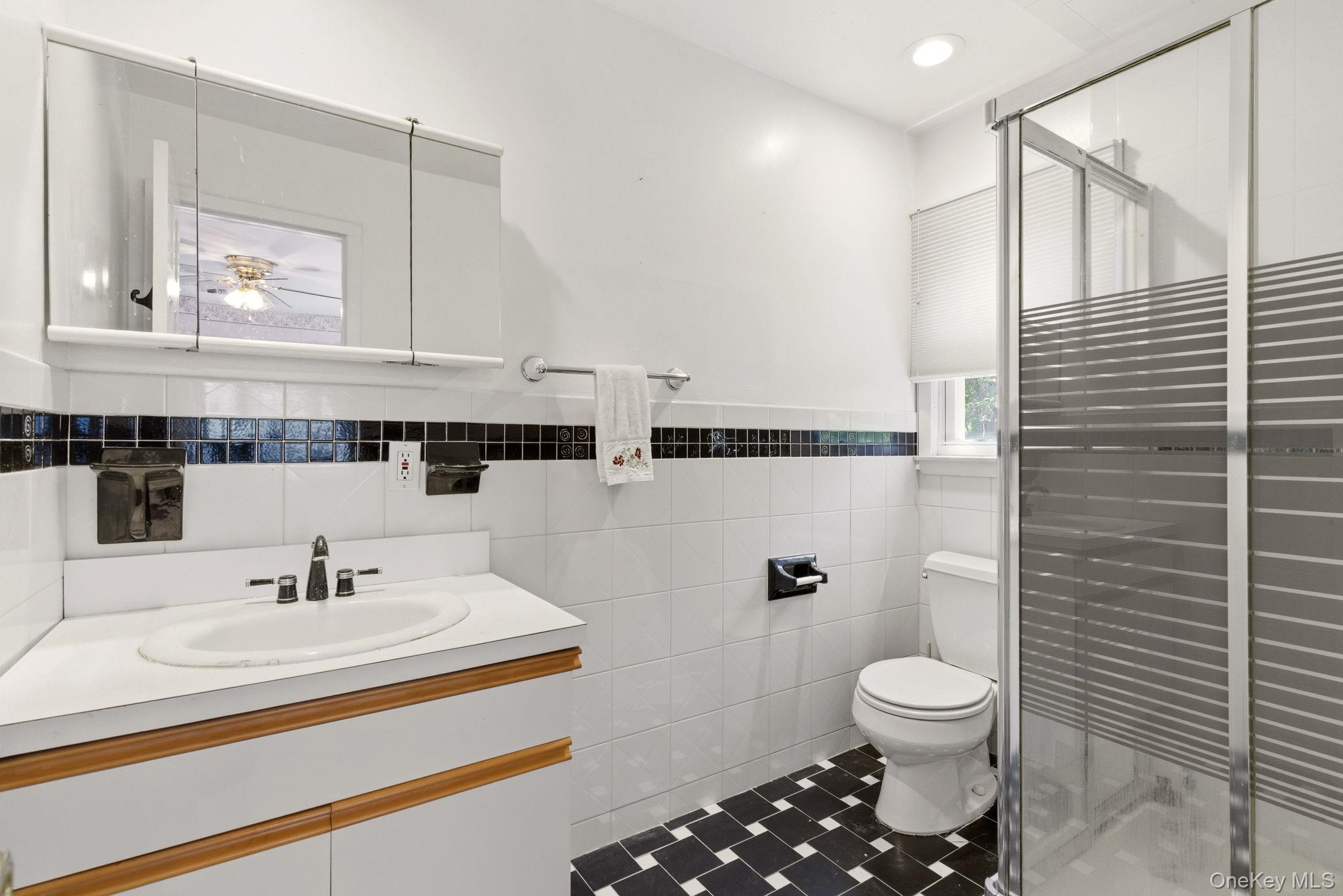 380 Duck Pond Road Locust Valley, NY 11560 - Photo 28 of 41 1st floor master-sized ensuite bath