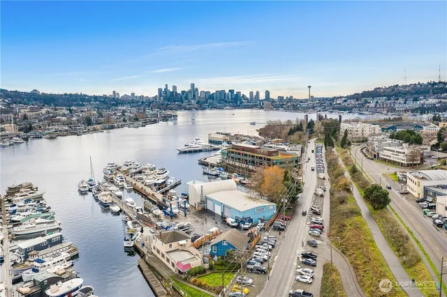 a picture of city view with lake view and boat