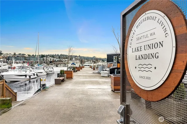 an outdoor space with a table and chairs