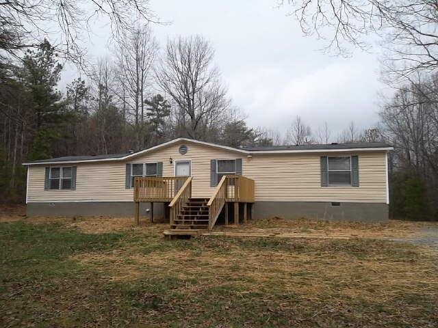 990 John Teem Road Talking Rock, GA 30175 - Photo 1 of 1 a house view with a backyard space