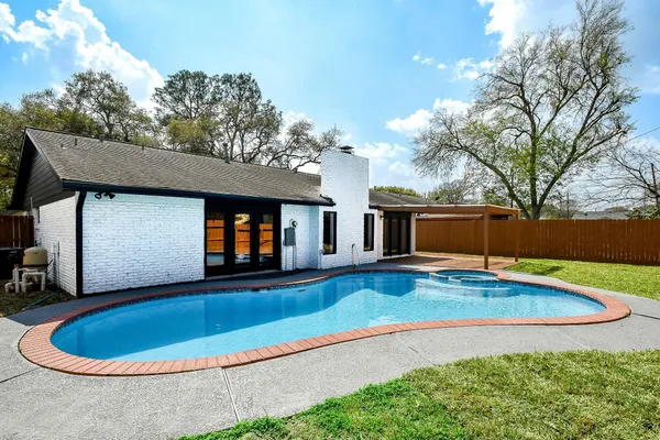 a view of outdoor space yard and swimming pool