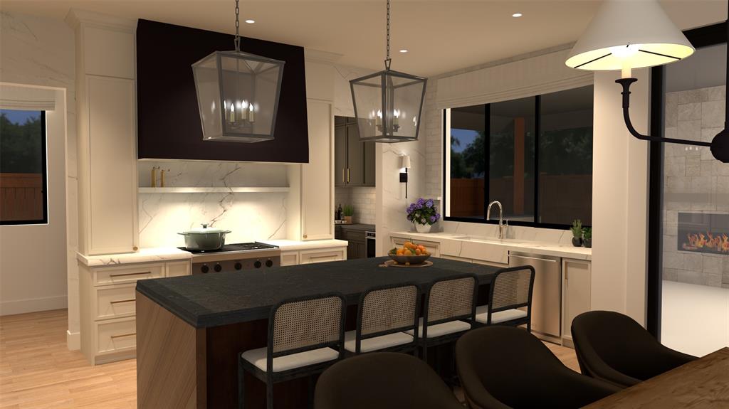 3316 Ferguson Road Grapevine, TX 76092 - Photo 2 of 3 a kitchen with stainless steel appliances kitchen island granite countertop a table chairs and a refrigerator