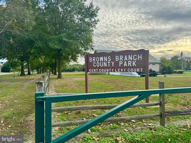 a sign broad on wooden wall