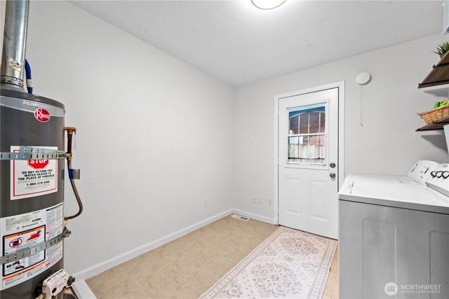 a storage room with a washer and dryer