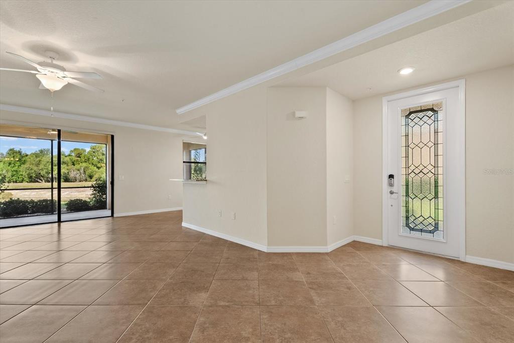 20080 Ragazza Circle, Unit 102 Venice, FL 34293 - Photo 14 of 49 an empty room with windows and closet