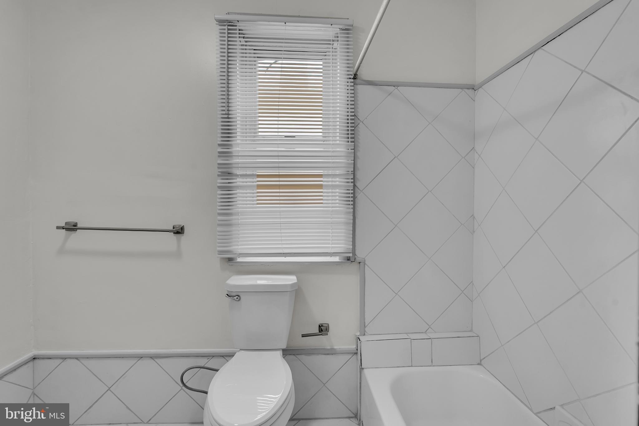 1419 Ellsworth Street Philadelphia, PA 19146 - Photo 13 of 17 a bathroom with a toilet and a shower