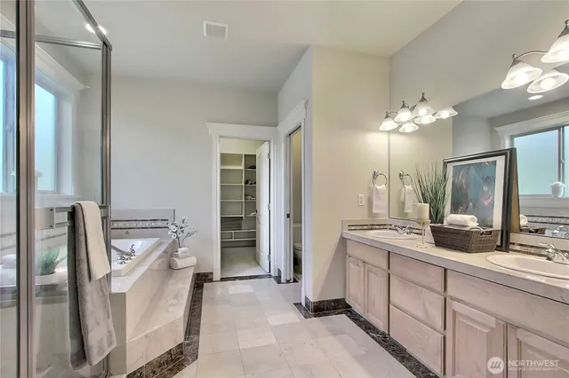 a kitchen with a sink stove and refrigerator