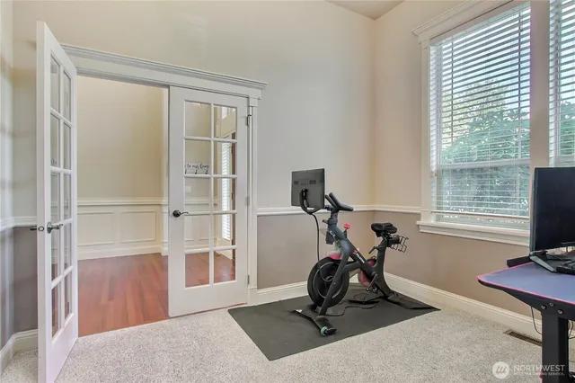a view of a room with gym equipment