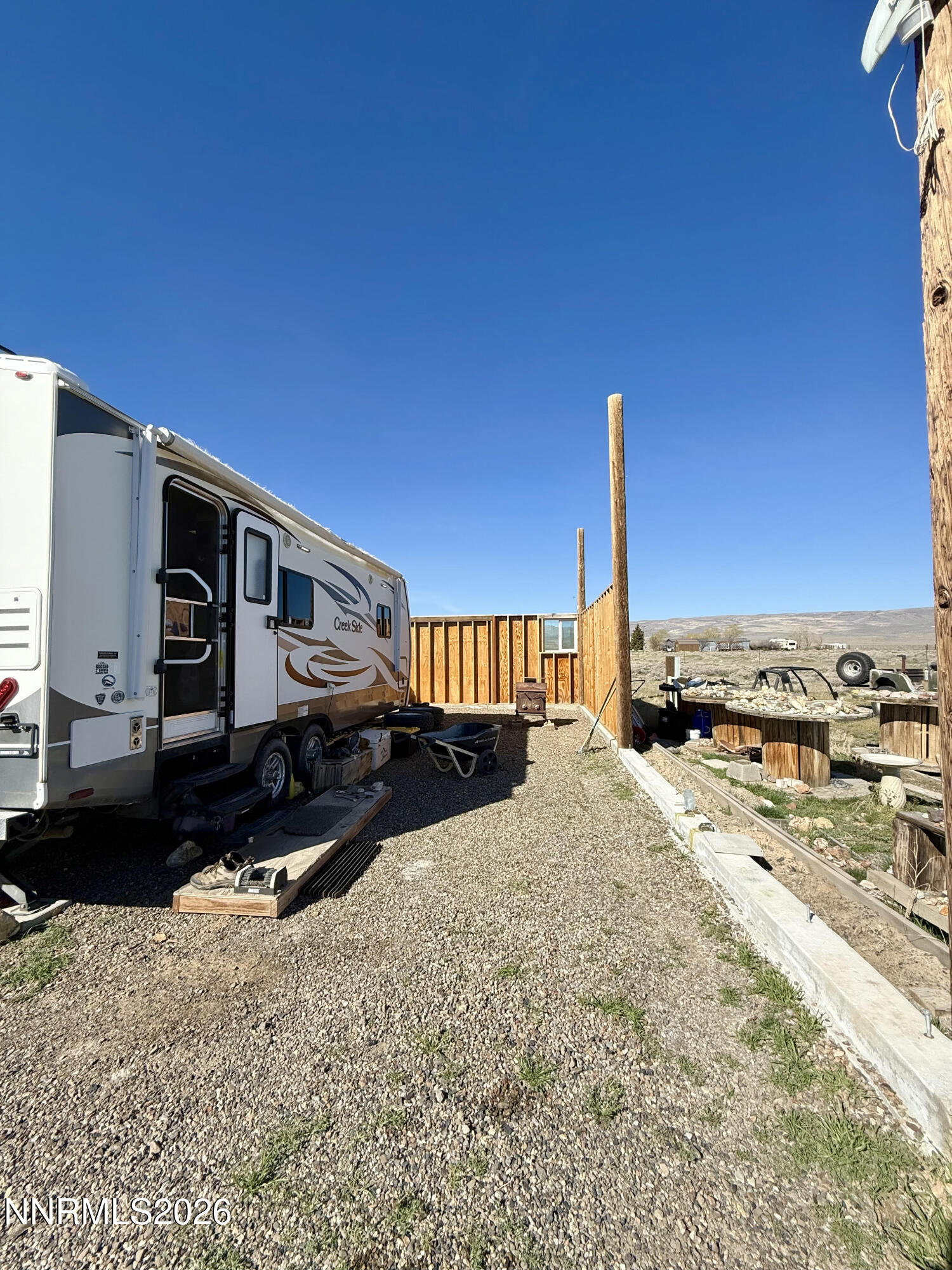 412 4th Street Crescent Valley, NV 89821 - Photo 13 of 34 a view of a house with a snow in the yard
