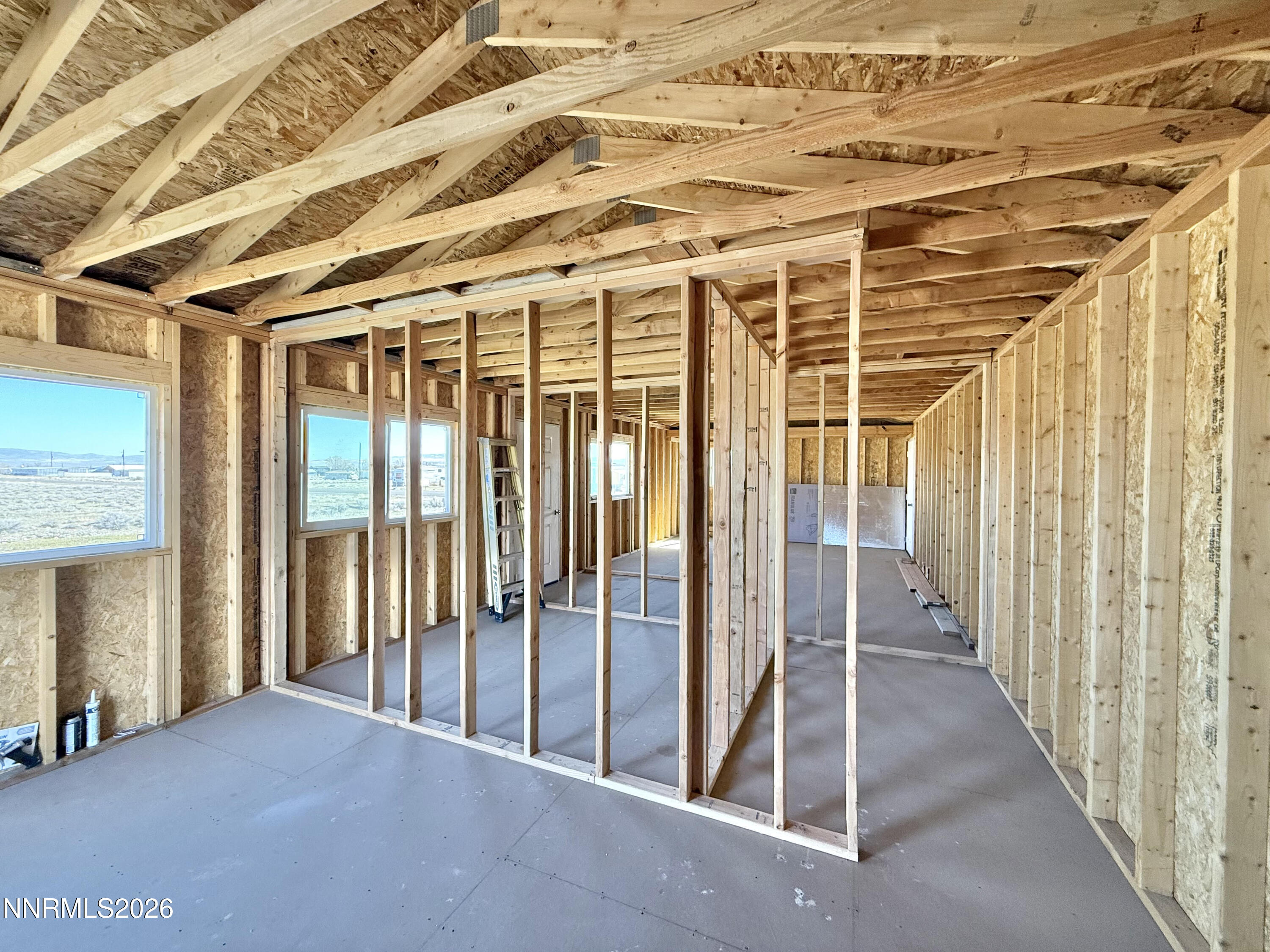 412 4th Street Crescent Valley, NV 89821 - Photo 28 of 34 a view of a room with wooden walls