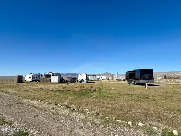 a view of houses with a city view