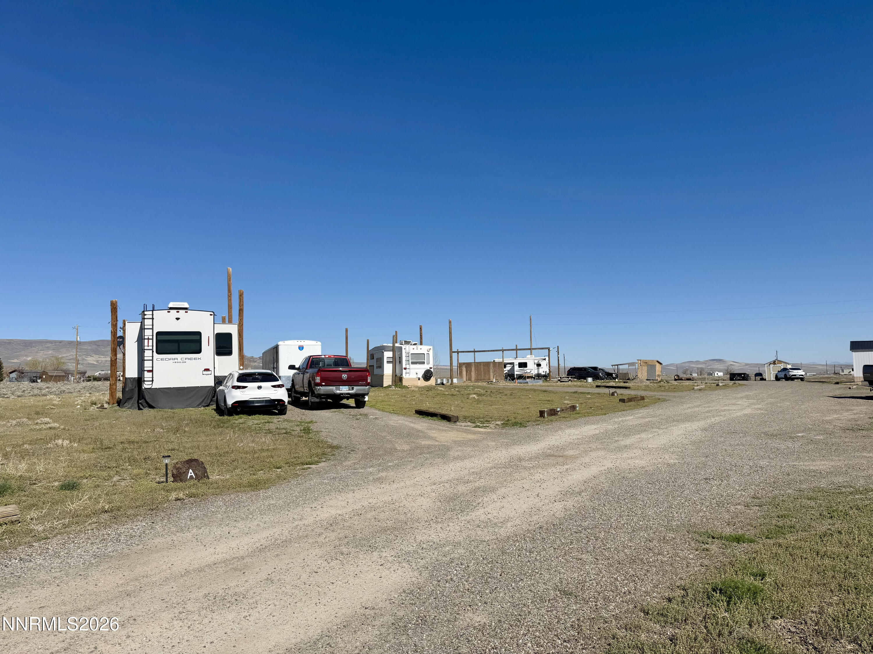 412 4th Street Crescent Valley, NV 89821 - Photo 9 of 34 a view of a ocean view with a car parked in the background