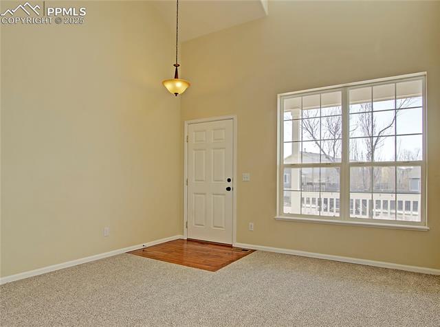 686 Pebble Crest Way Colorado Springs, CO 80921 - Photo 7 of 30 Living room looking out toward from porch
