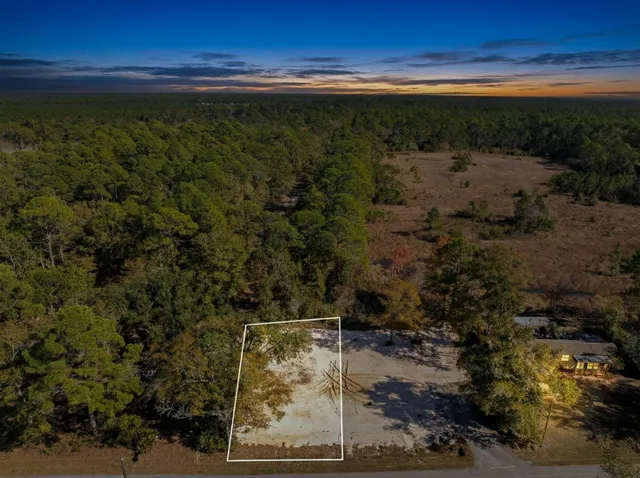 a view of a yard with lake view