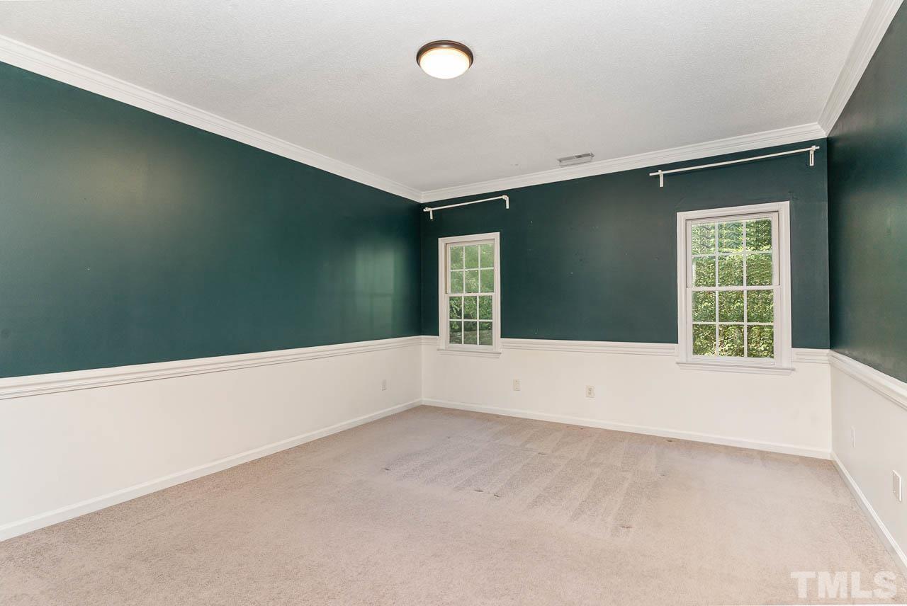 2909 Englefield Drive Raleigh, NC 27615 - Photo 23 of 31 an empty room with windows