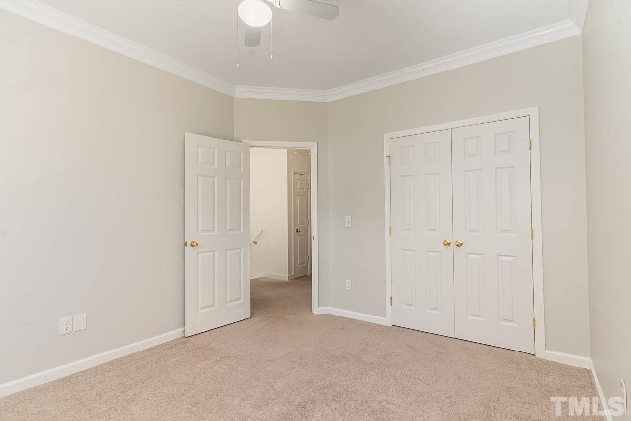 2909 Englefield Drive Raleigh, NC 27615 - Photo 27 of 31 a view of an empty room and closet area