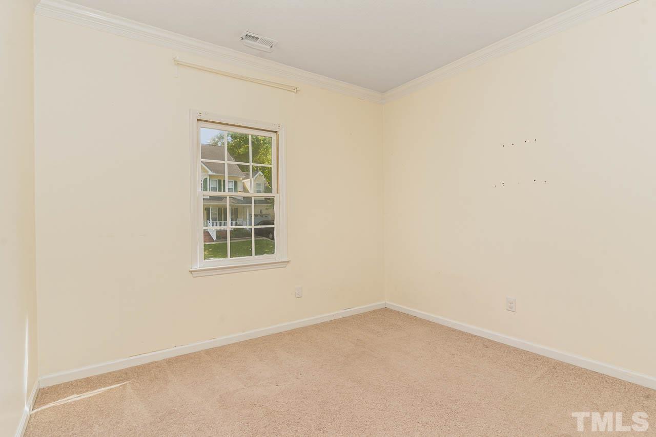 2909 Englefield Drive Raleigh, NC 27615 - Photo 28 of 31 an empty room with a window