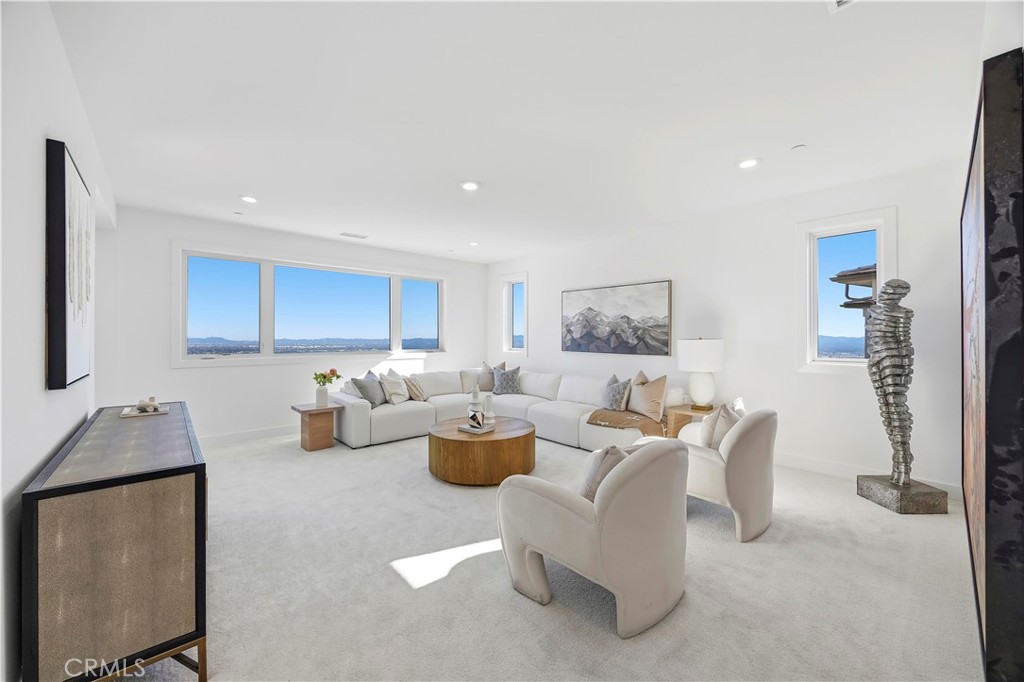 20138 Marlow Lane Porter Ranch, CA 91326 - Photo 16 of 39 a living room with furniture and a window