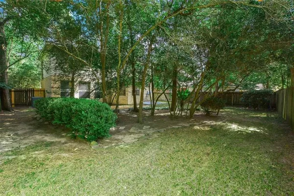 a view of backyard with green space