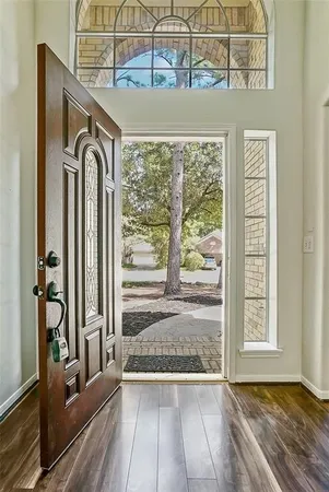a view of front door and bedroom