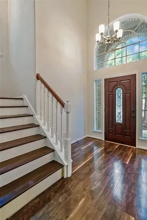 a view of entryway with wooden floor