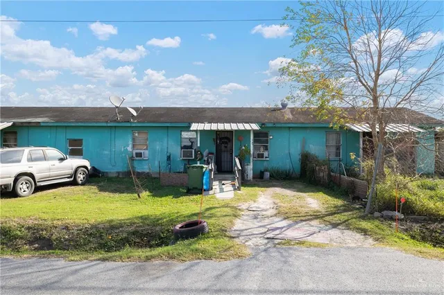 a view of a city and mountains in a big yard