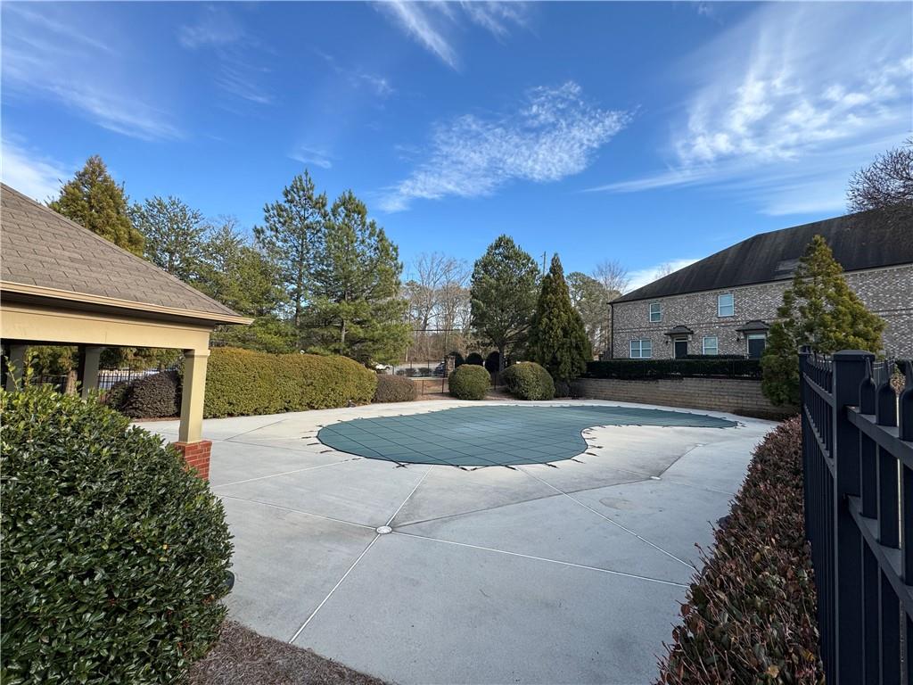 805 Pleasant Hill Road, Unit 333 Lilburn, GA 30047 - Photo 18 of 22 a view of backyard of house with green space