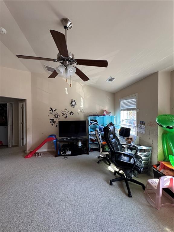 805 Pleasant Hill Road, Unit 333 Lilburn, GA 30047 - Photo 6 of 22 a living room with furniture and a gym machine
