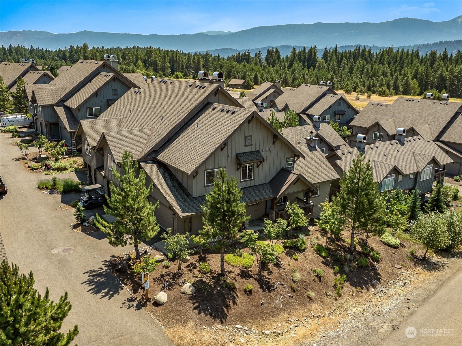 50 Keystone Lane, Unit 4 Ronald, WA 98940 - Photo 1 of 34 an aerial view of a house with a mountain