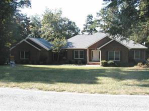 497 Kemp Road Mooresville, NC 28117 - Photo 1 of 8 a front view of a house with a yard